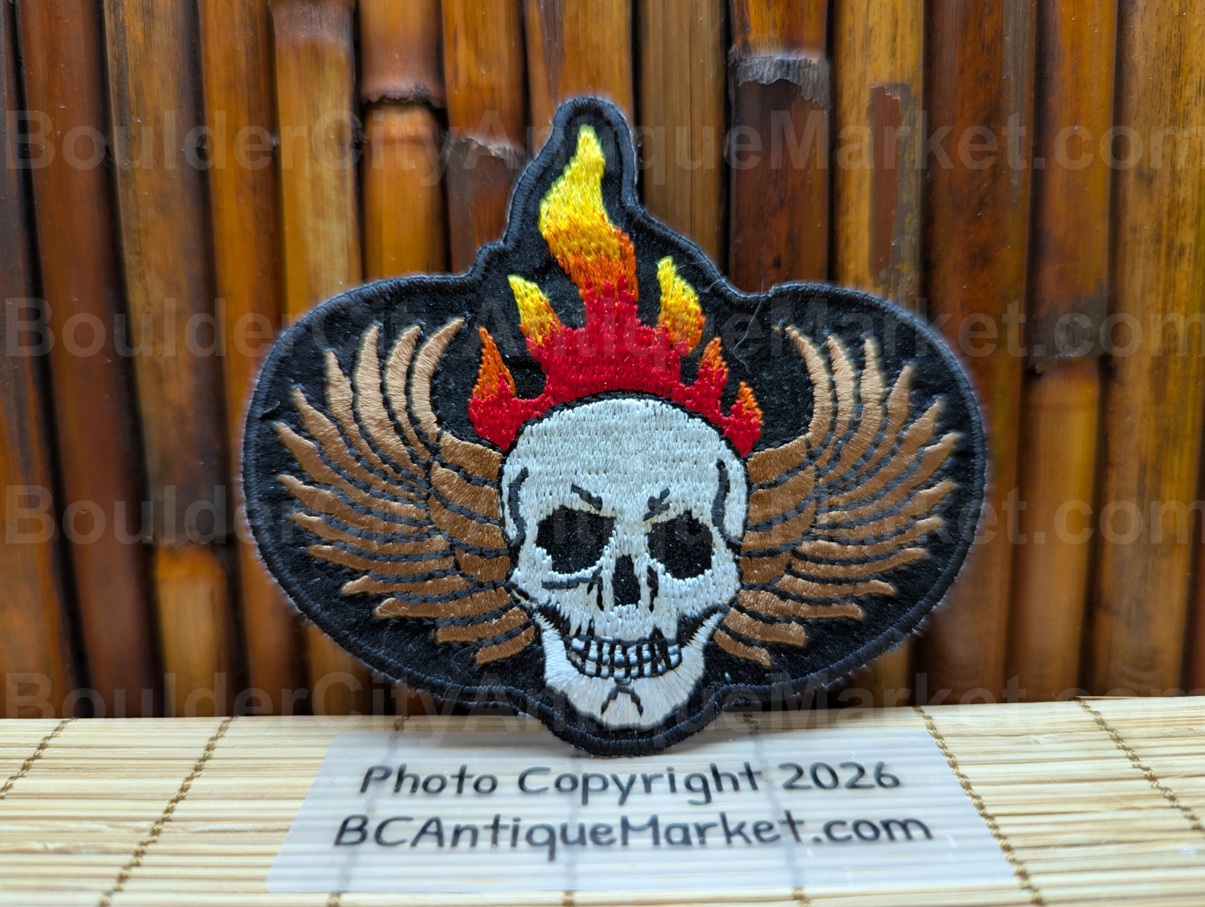 Flaming Skull With Wings Iron On Patch
