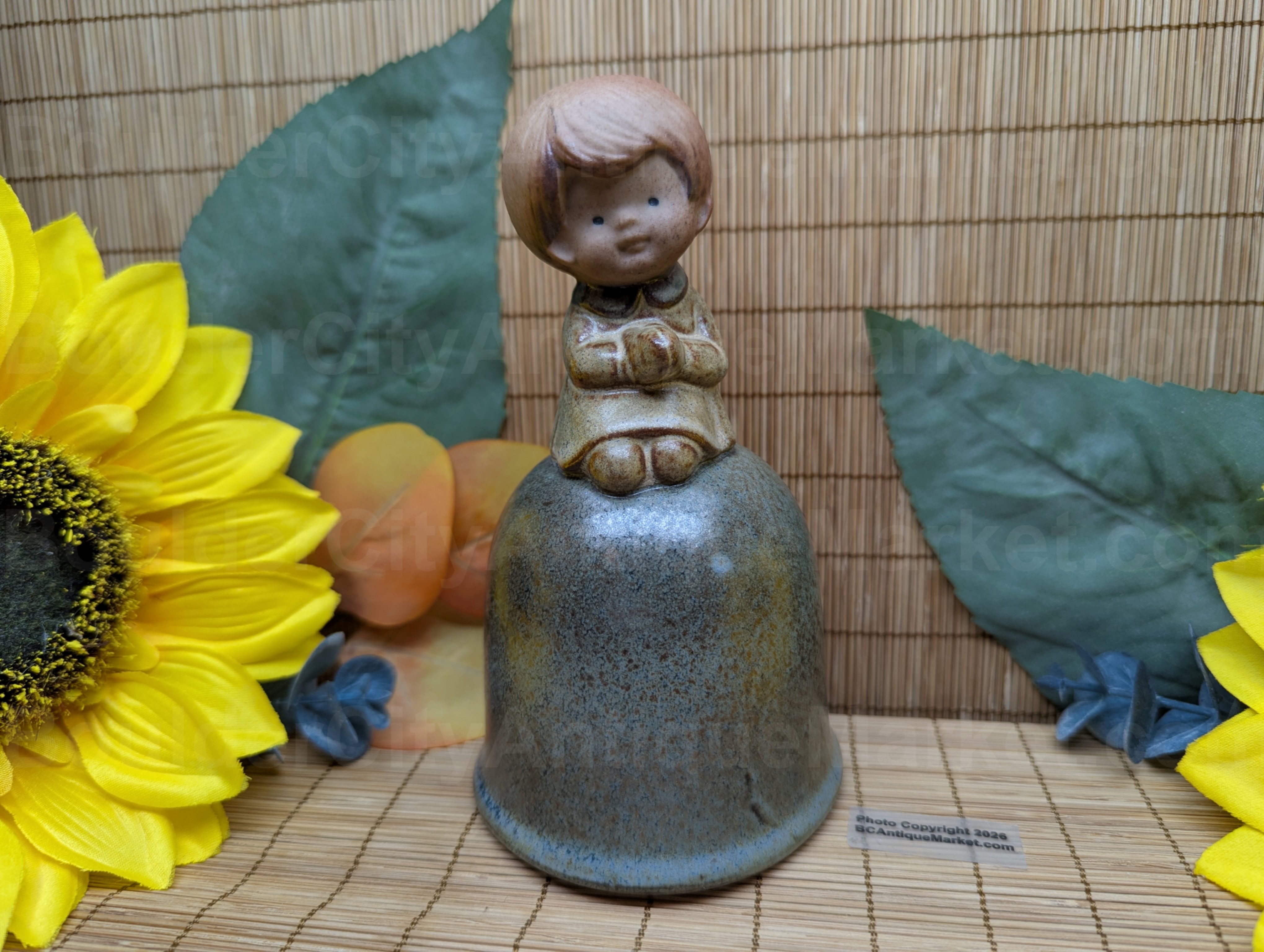 UCTCI Stoneware Praying Child Bell