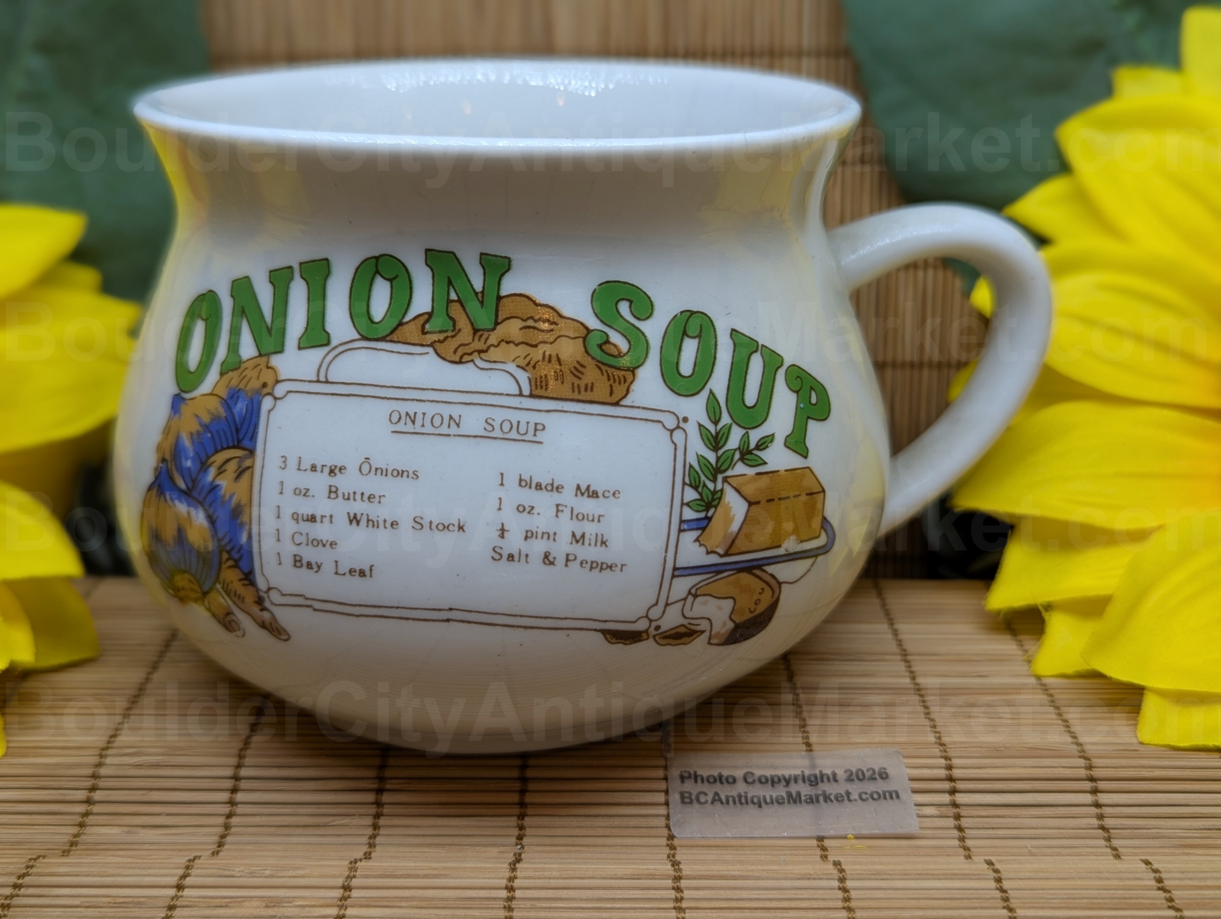 Onion Soup recipe mug from Tabletops Unlimited. Green letters and bright graphics surround the "recipe card" on the mug.