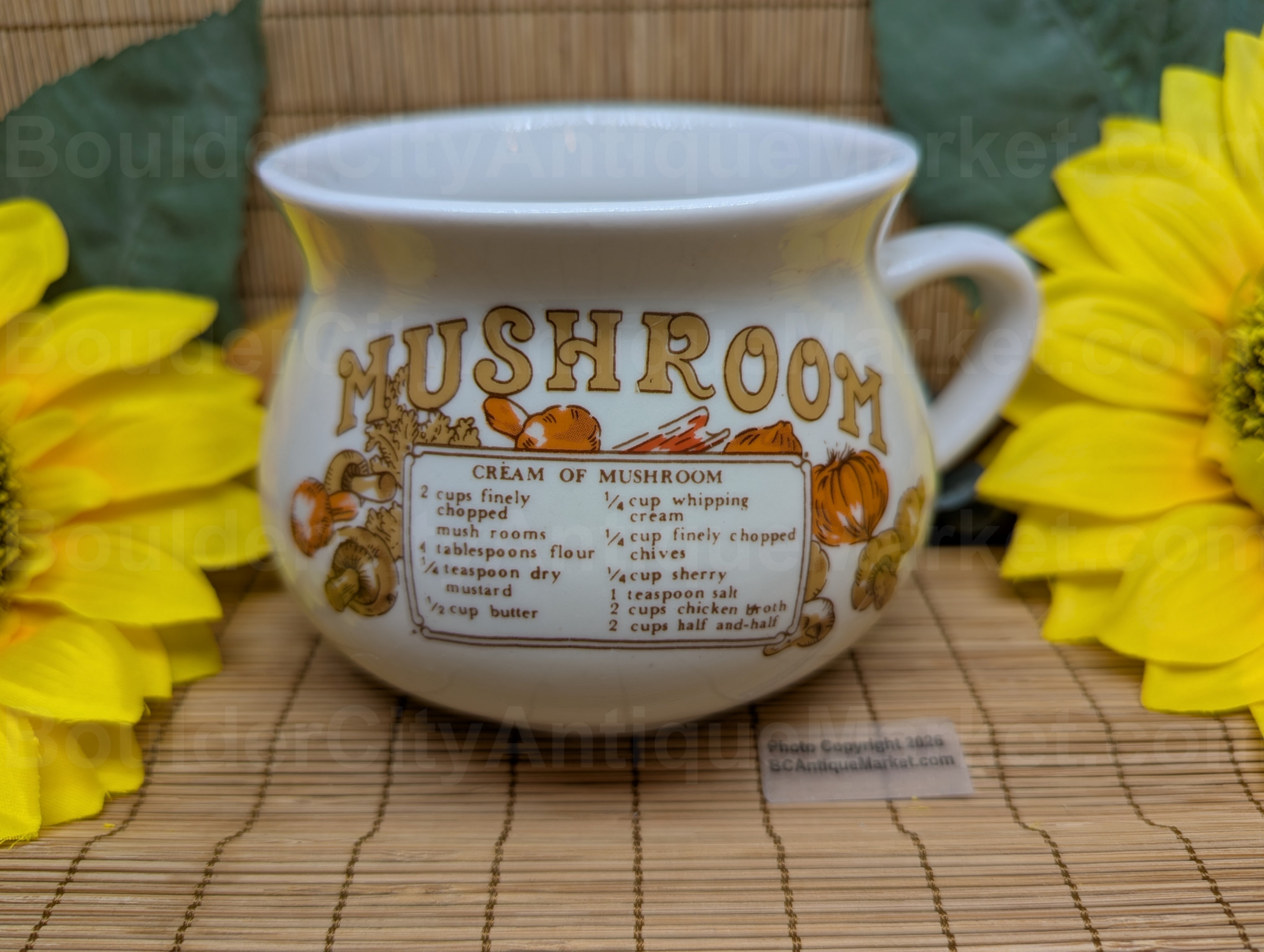 Cream of Mushroom soup recipe mug by Tabletops Unlimited. Graphics of mushrooms and vegetables are in browns and oranges.