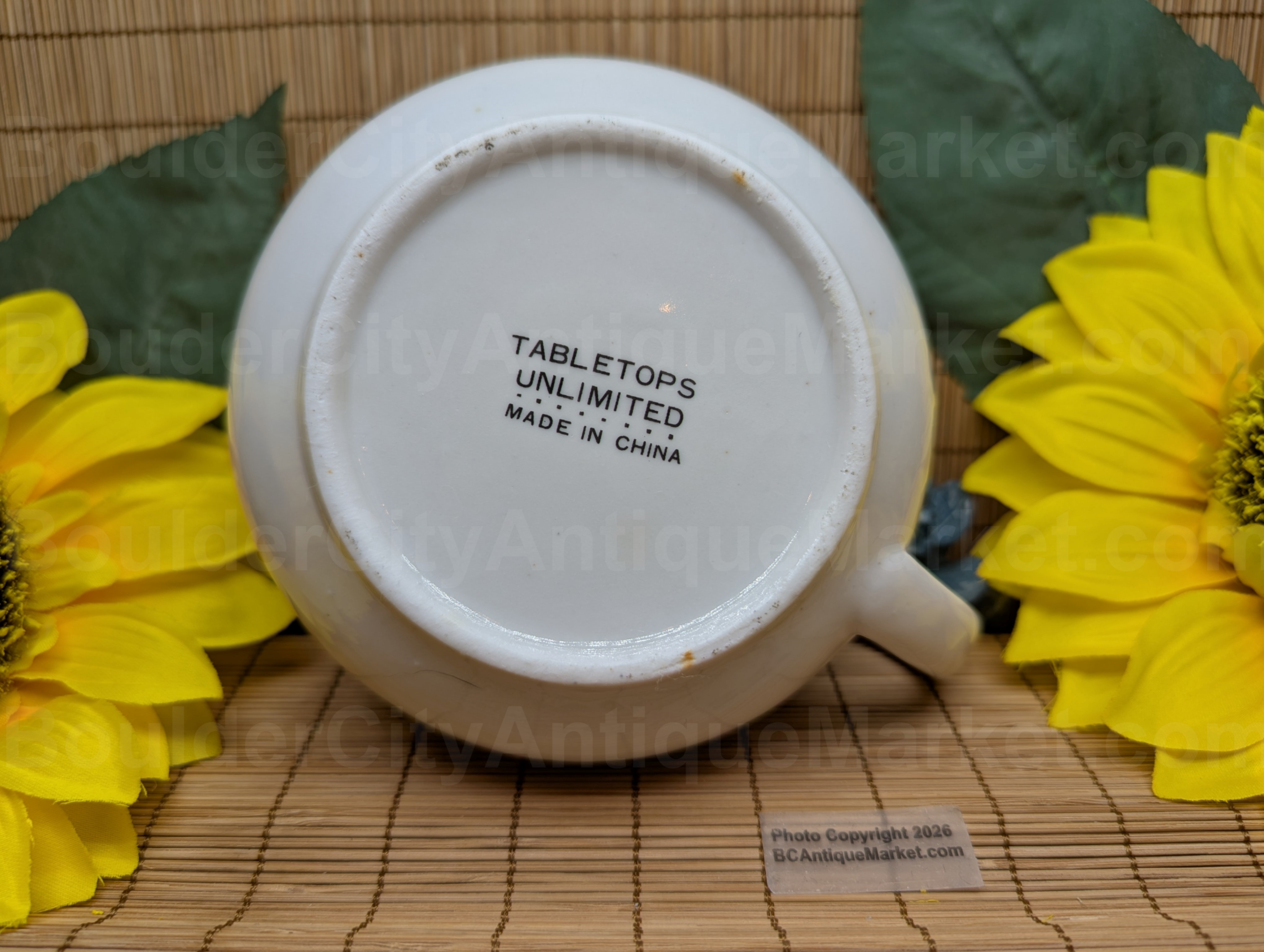 Cream of Mushroom soup recipe mug by Tabletops Unlimited. Graphics of mushrooms and vegetables are in browns and oranges. View of manufacture label on bottom.
