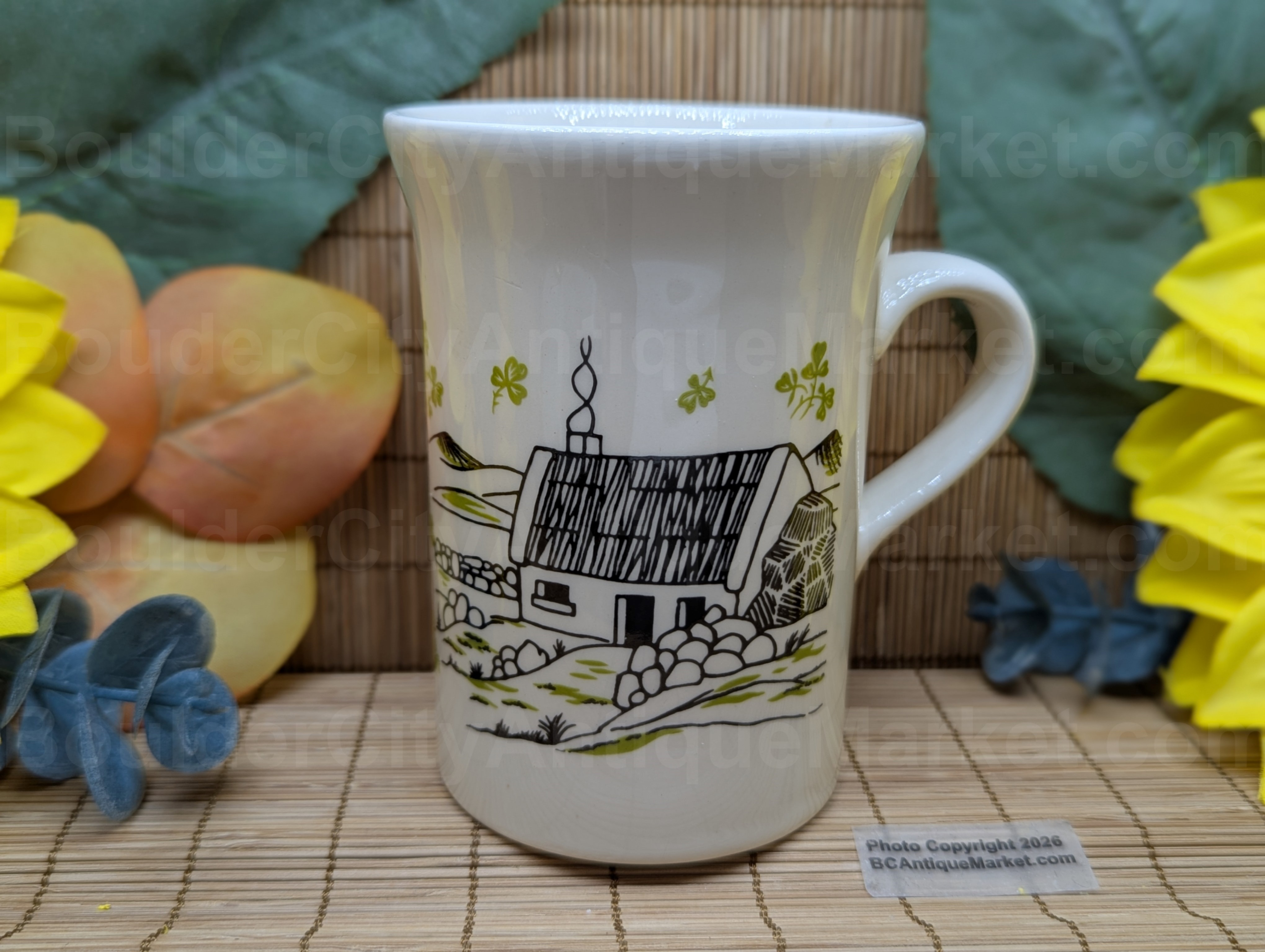 Irish Coffee recipe mug from Carrigdhoun Pottery, County Cork, Ireland. The pottery was most active from the 1960s to the 1980s, and closed in the late 1990s. There were several varieties of these mugs made, this one is four inches tall and three inches in diameter, with the Irish Coffee recipe on the back.