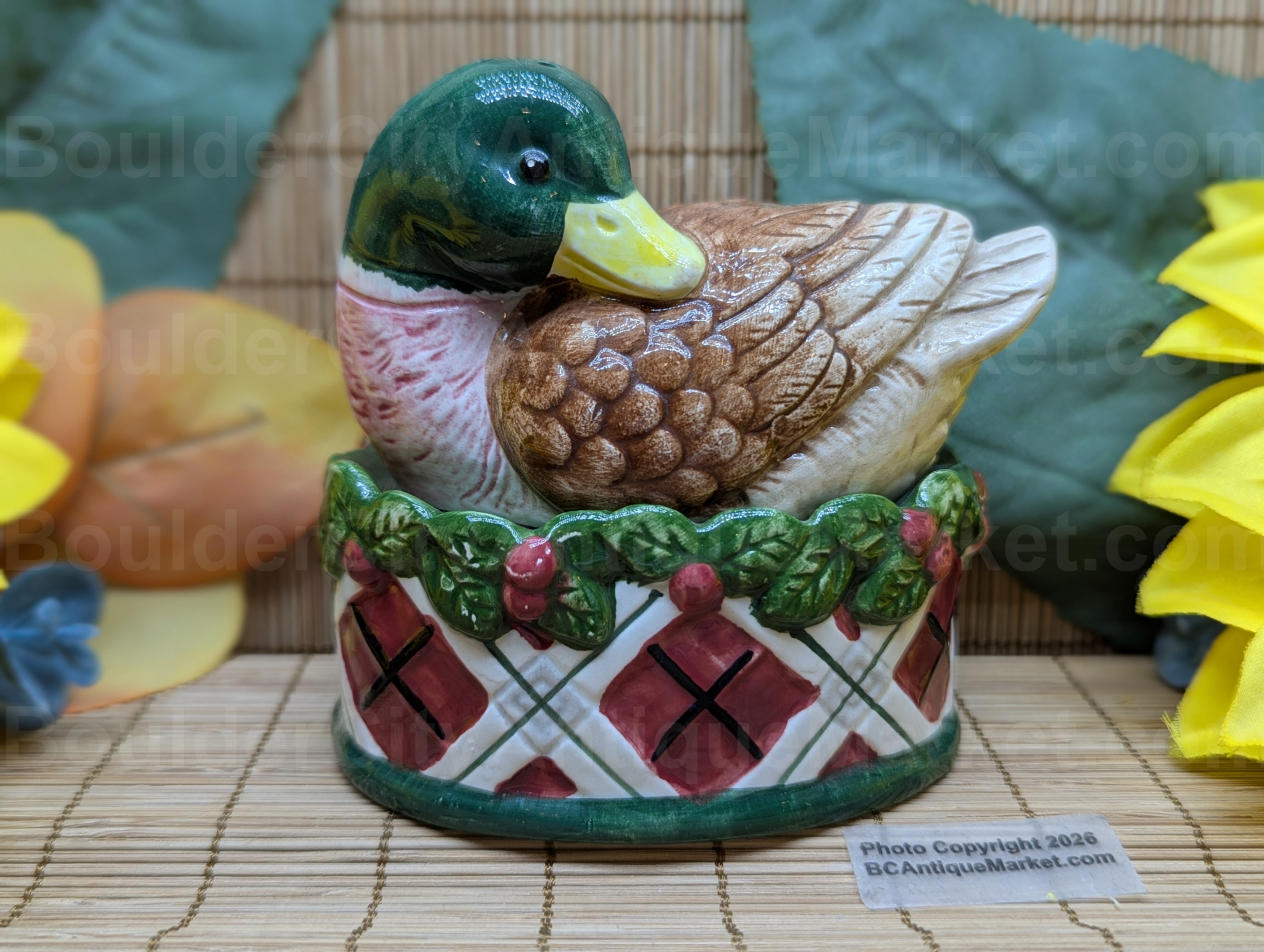 Noritake Royal Hunt, pattern 3930, features a mallard duck on a basket as a salt and pepper set produced between 1990 and 2005. Stacked set stands 3.75 inches tall.