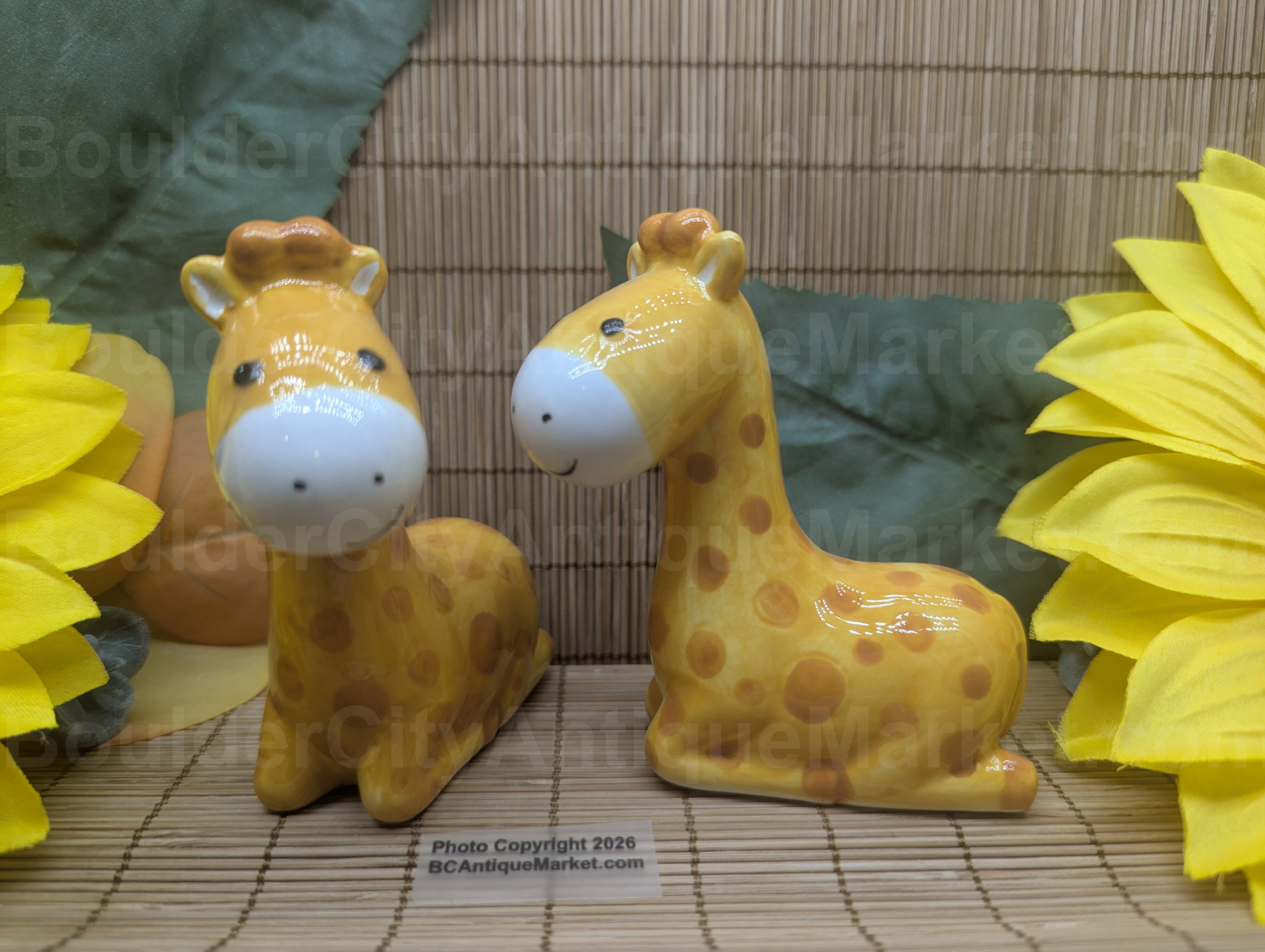 Giraffe pair stands 3.5 inches high and are brand new.