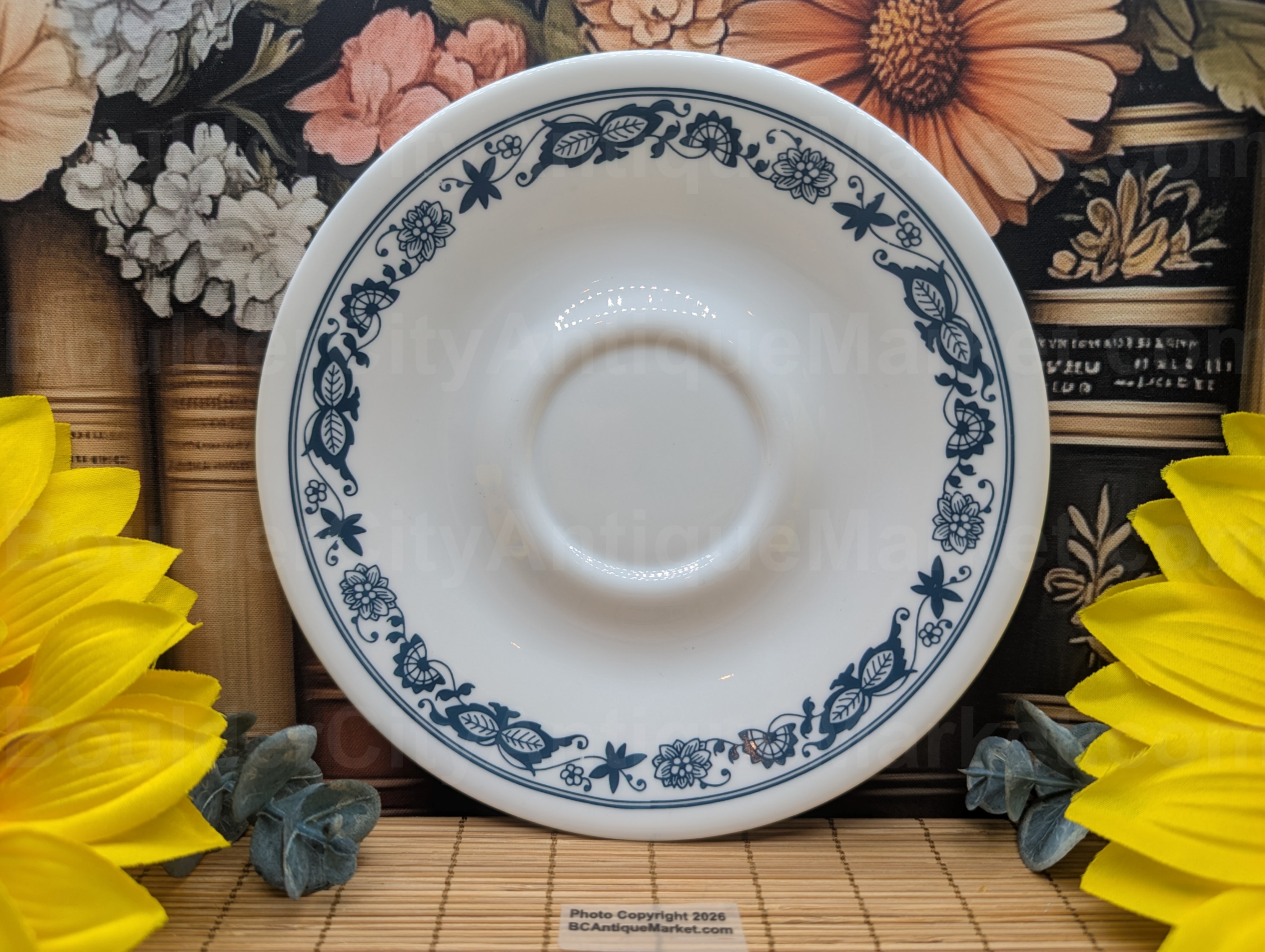 6.25-inch diameter saucer in the Old Town Blue pattern produced from 1972-2005.